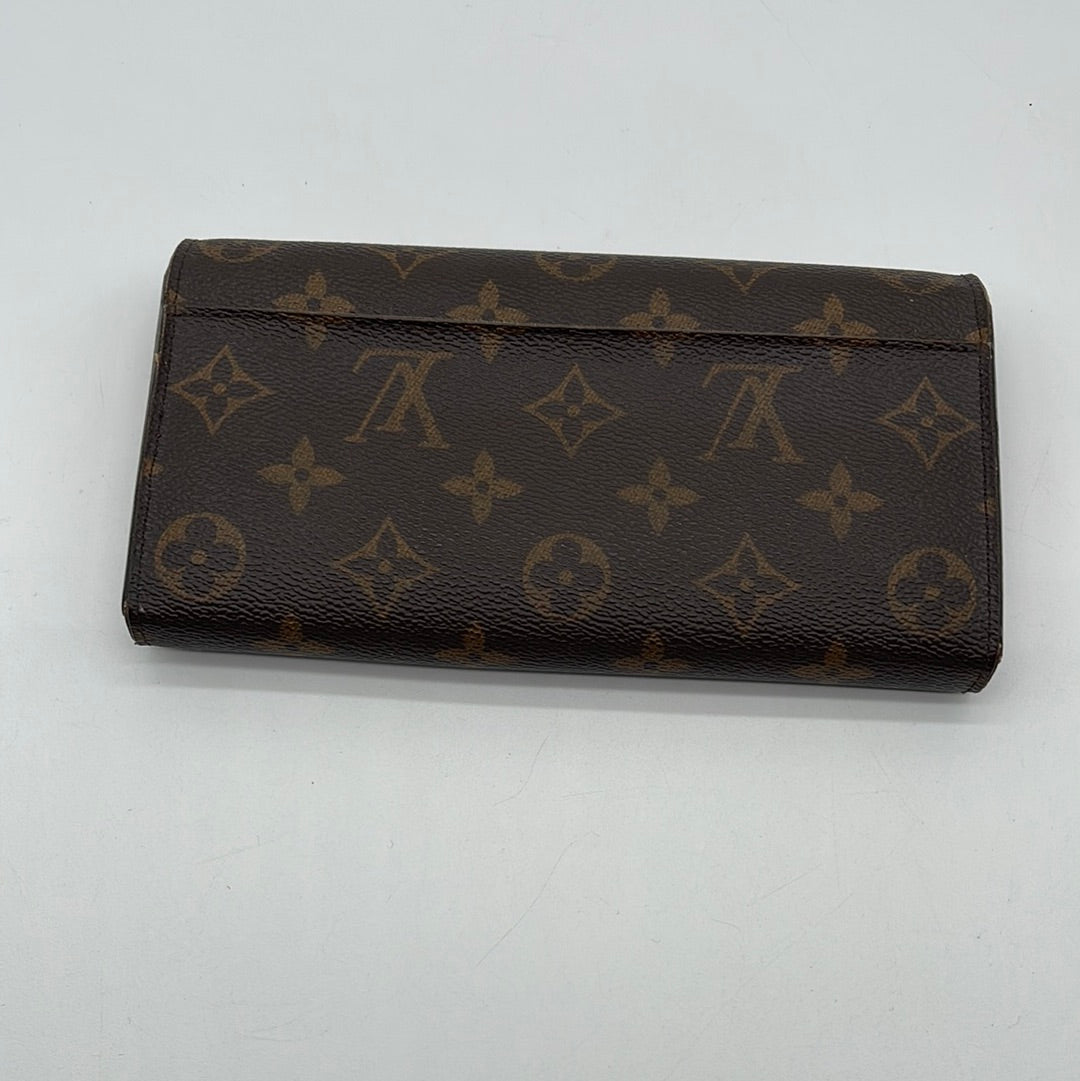 PRELOVED Louis Vuitton Monogram Portefeuille Sarah Long Wallet -Rasberry Interior YXY8HJR 041824 H