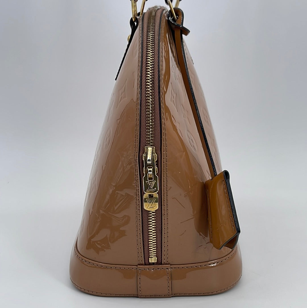 Lot 2182 - Louis Vuitton Monogrammed Alma Bag with tan