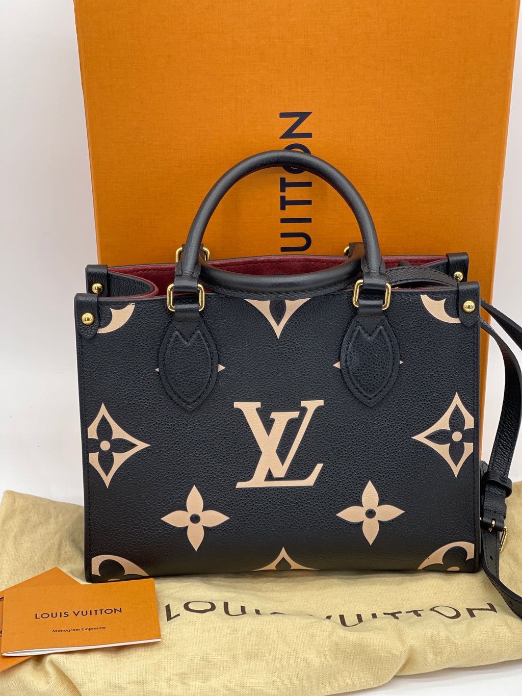 Preloved Louis Vuitton OnTheGo Tote Black and Beige Giant Monogram Empreinte PM Tote JR9JXY4 061724 P