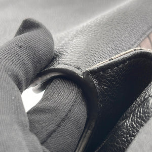 Pochette Métis bag in black imprint leather Louis Vuitton - Second