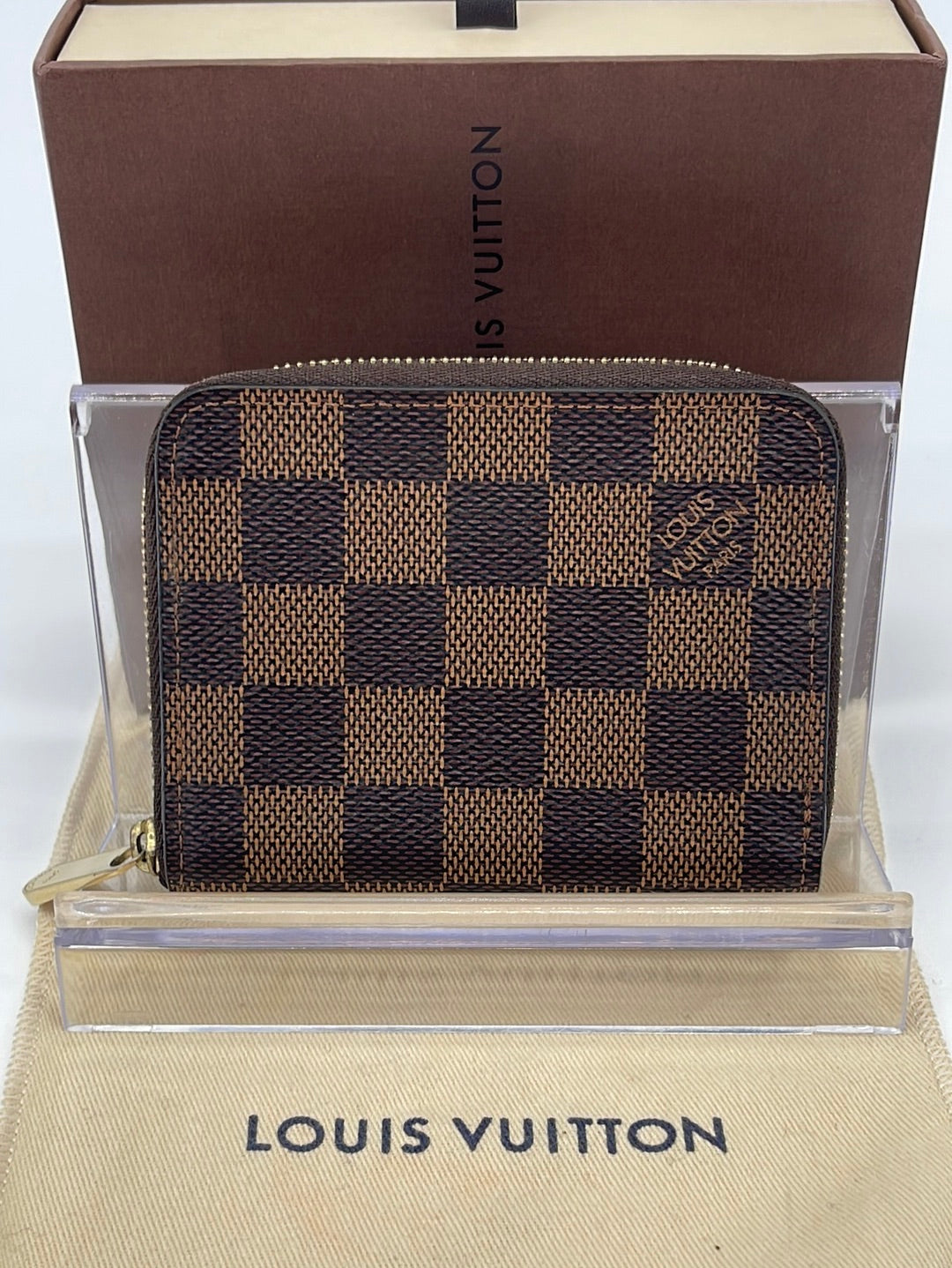 SOLD Authentic Louis Vuitton Wallet Damier Ebene  Louis vuitton wallet,  Zip coin pouch, Vuitton box