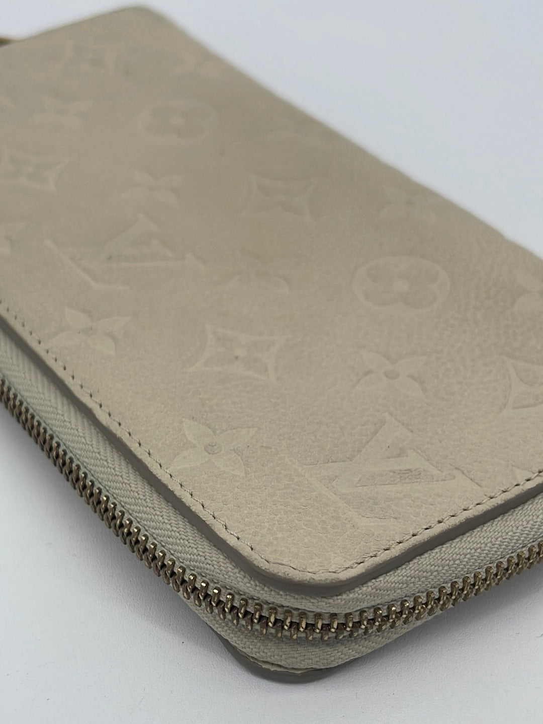 Authentic Louis Vuitton Ivory Empreinte Leather Long Zippy Wallet