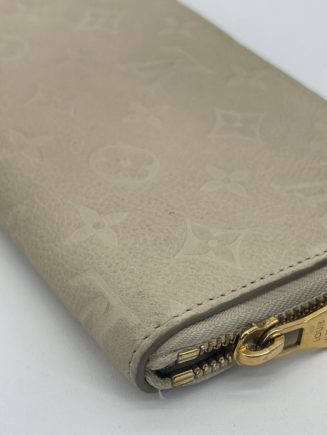 Louis Vuitton, Bags, Louis Vuitton Ivory Monogram Empreinte Leather Secret  Long Wallet