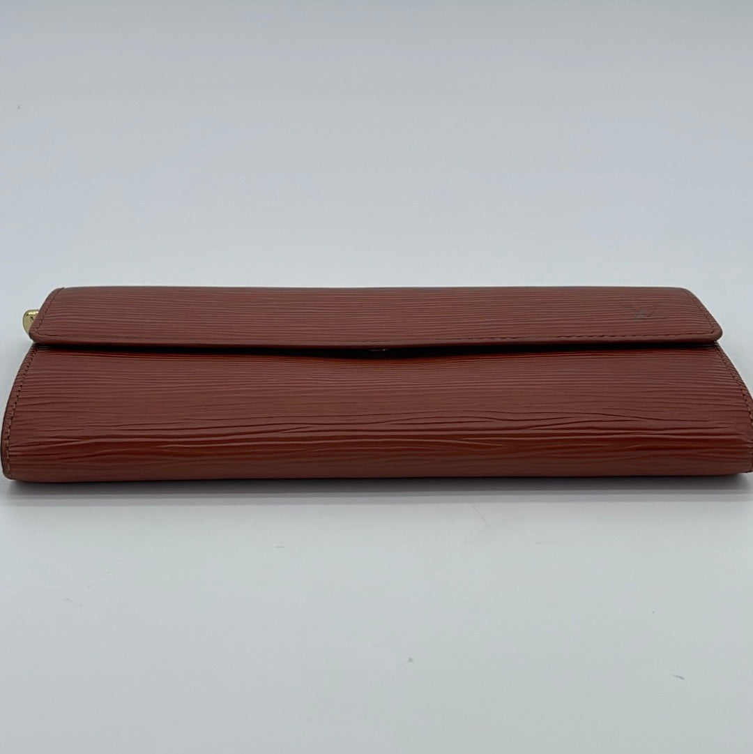 Leather wallet Louis Vuitton Brown in Leather - 33660446