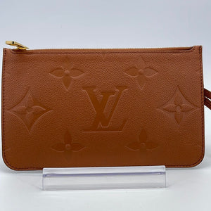 Slightly used Louis Vuitton Wristlet Pouch / clutch LV