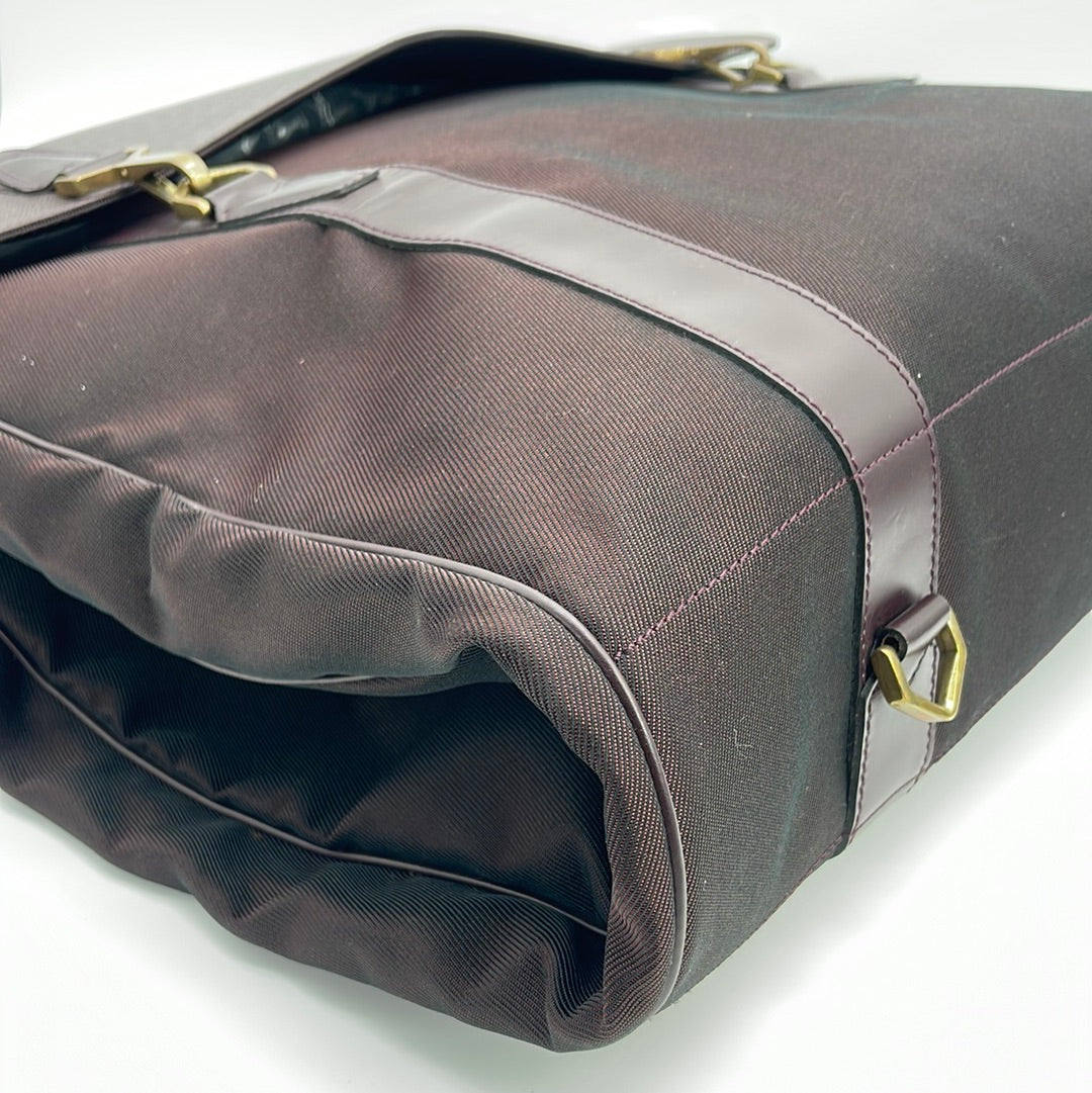 Louis Vuitton, A Gibeciere taiga and nylon garment bag. - Bukowskis