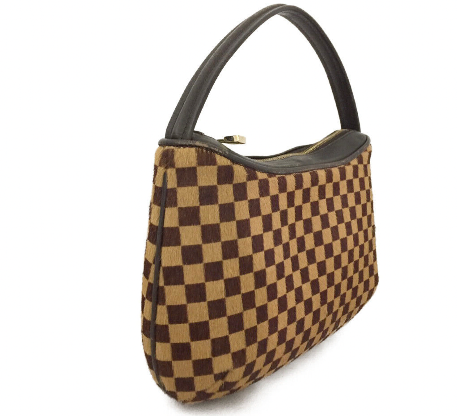 The limited-edition Louis Vuitton Damier Sauvage calfskin Vivian bag is an  exquisite piece.…