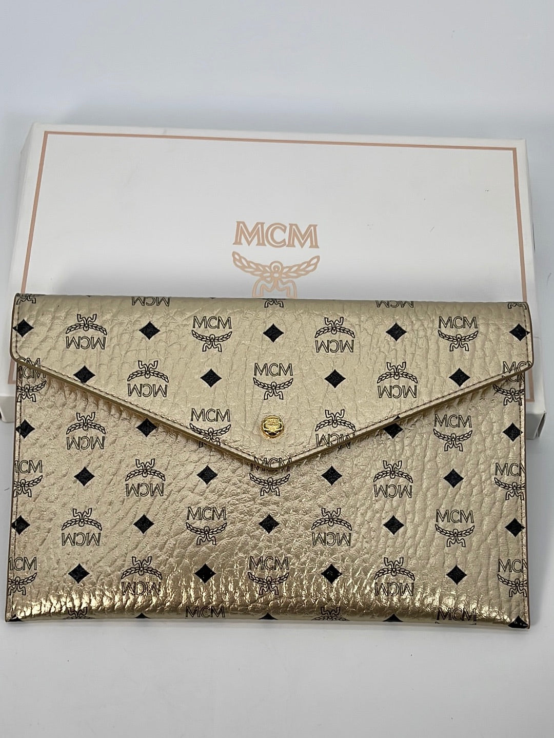 Leather clutch bag MCM Gold in Leather - 34023600
