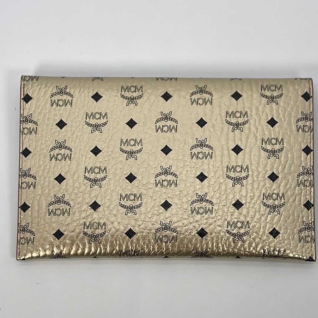 MCM Canvas Clutch Bag (pre-owned) in Metallic