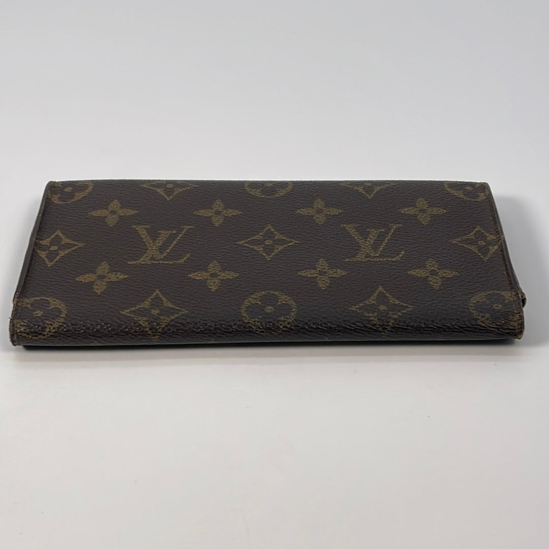 Sold at Auction: Louis Vuitton Leather Checkbook Cover