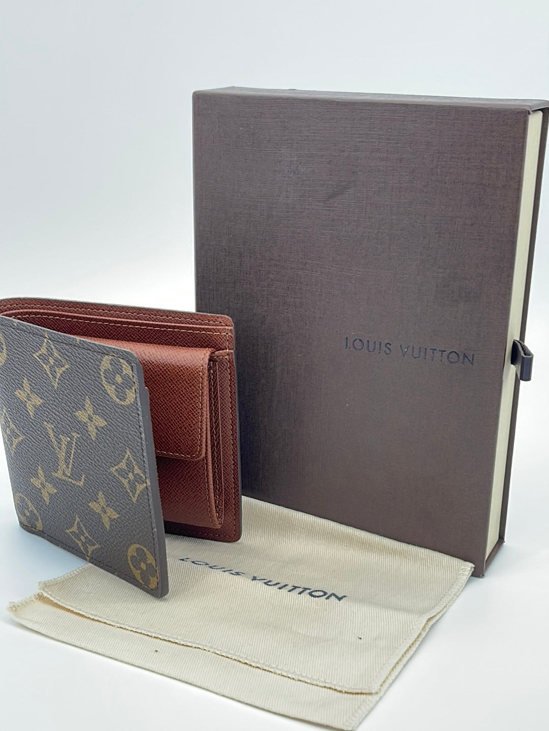 used) Louis Vuitton Mens Bifold Wallet Monogram for Sale in