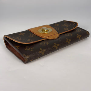 Louis Vuitton, monogram bowtie wallet. - Unique Designer Pieces