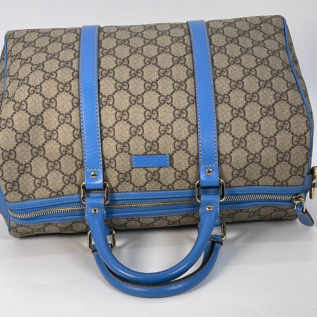 At Auction: Gucci GG Canvas and Leather Charmy Boston Bag