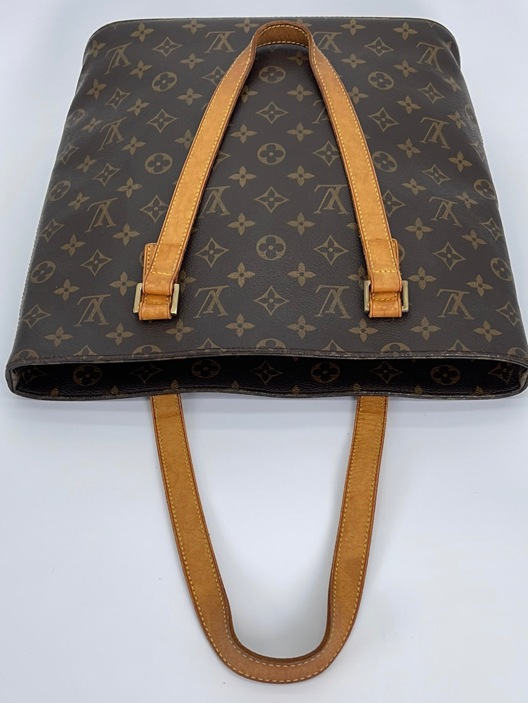 LOUIS VUITTON Carry It Reverse Monogram VHS Coated Canvas And Vachetta Tote  Gold Tone Hardware Available For Immediate Sale At Sotheby's