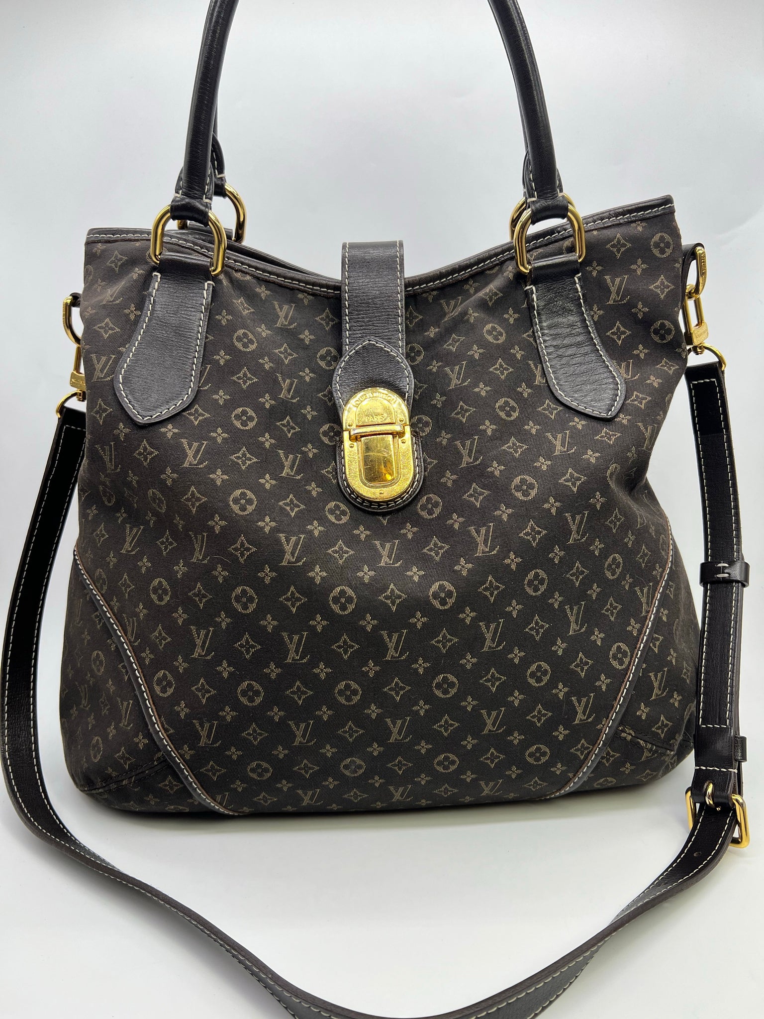 LOUIS VUITTON HANDBAG, monogram pattern with leather trims and two