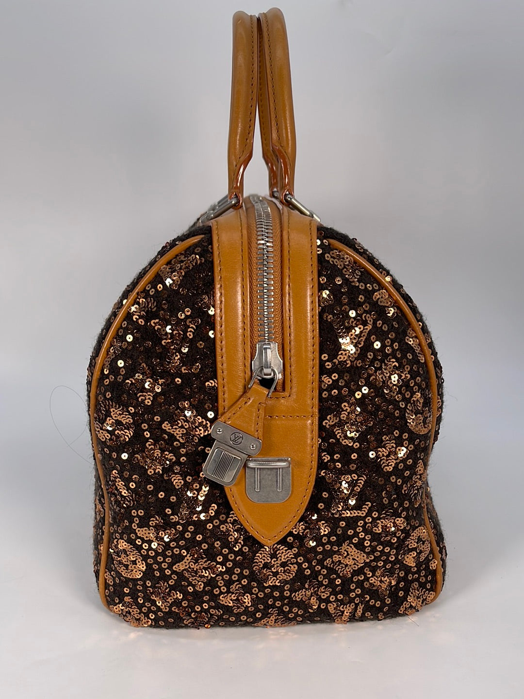 LOUIS VUITTON, a leather and woolmix monogrammed sequin embellished handbag,  Sunshine express speedy 30. - Bukowskis